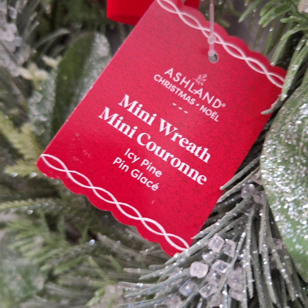 Ashland Frosted Green Pine Wreath with Red Bow Accent